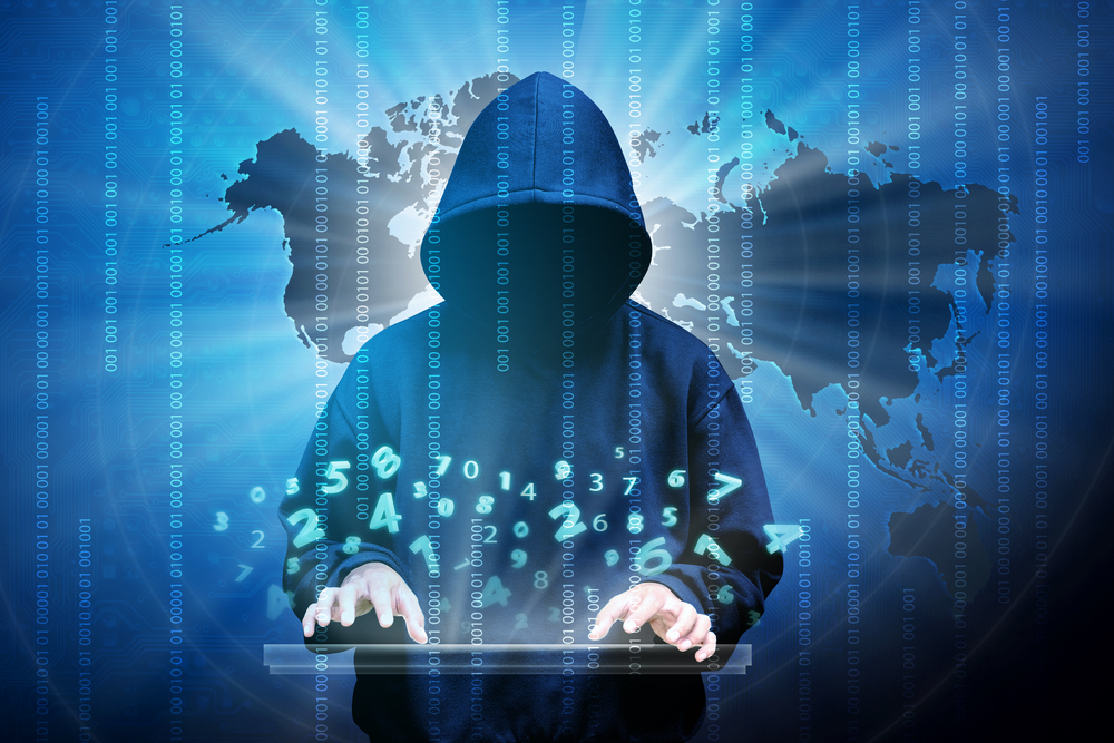 A silhouette of a hooded figure, representing a computer hacker, stands against a backdrop of binary code and network security terminology.