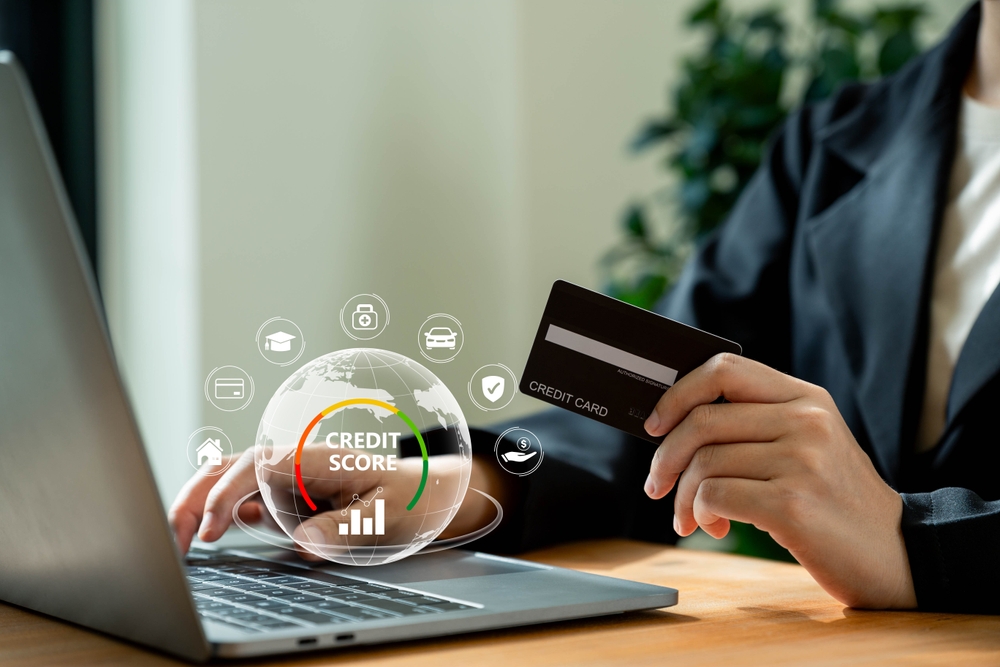 Businesswoman using a laptop to review the impact of medical debt on credit scores