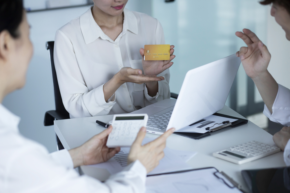 people meeting with a credit counselor.